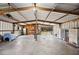 Spacious garage space with high ceilings offering endless opportunities at 8337 Fussell Rd, Polk City, FL 33868