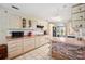 Spacious kitchen featuring plenty of cabinet space and neutral countertops at 8337 Fussell Rd, Polk City, FL 33868
