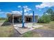 Large workshop with an auto lift and ample space for projects and equipment at 8337 Fussell Rd, Polk City, FL 33868