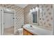 Bathroom with a single sink vanity and a white countertop with a tile floor at 8341 Mitchall Dr, Lakeland, FL 33809