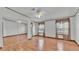 Bedroom featuring wood floors, sliding closet doors and natural light at 8341 Mitchall Dr, Lakeland, FL 33809