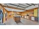 Organized garage with work bench, pegboard, and storage cabinets for all your projects at 8341 Mitchall Dr, Lakeland, FL 33809