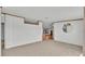 Neutral living room with carpeted floors and potential for customization at 8341 Mitchall Dr, Lakeland, FL 33809