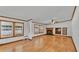 Inviting living room with hardwood floors and a fireplace, offering a cozy ambiance at 8341 Mitchall Dr, Lakeland, FL 33809