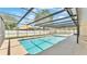 Beautiful screened-in pool area with plenty of sunlight, perfect for leisure and entertainment at 8341 Mitchall Dr, Lakeland, FL 33809
