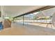 Expansive, screened-in pool area with ramp access and a seating area for ultimate relaxation at 8341 Mitchall Dr, Lakeland, FL 33809