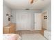 Bedroom featuring a closet, a dresser, and light-colored floors at 1503 Clairdale Ln, Lakeland, FL 33801