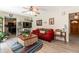 Inviting living room with wood flooring and bright, neutral paint at 1503 Clairdale Ln, Lakeland, FL 33801