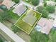 Aerial view of property highlighting the house, lot lines, landscaping, and neighborhood at 3300 Hawks Ridge Dr, Lakeland, FL 33810
