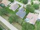 Aerial view of real estate with a lush green landscape and neighborhood at 3300 Hawks Ridge Dr, Lakeland, FL 33810