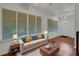 Bright living room features hardwood floors and a large window for plenty of natural light at 6545 Lake Clark Dr, Lakeland, FL 33813