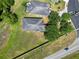 Aerial view highlighting the home's layout, expansive backyard, and overall property size in a residential area at 1167 Stoney Creek Blvd, Lakeland, FL 33811
