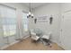Cozy breakfast nook with natural light, a modern chandelier, and seating for four at 1167 Stoney Creek Blvd, Lakeland, FL 33811