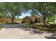 This home features a spacious driveway, a beautifully landscaped front yard, and a welcoming entrance at 1167 Stoney Creek Blvd, Lakeland, FL 33811