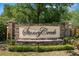 Stone Creek entrance sign with stone accents and lush landscaping at 1167 Stoney Creek Blvd, Lakeland, FL 33811