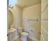 A basic bathroom with a toilet, sink and vanity at 2303 Brassie Ct, Winter Haven, FL 33884
