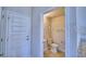 Convenient downstairs bathroom with a toilet and sink near the front door at 2303 Brassie Ct, Winter Haven, FL 33884