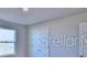 Bedroom with windows and closet at 2303 Brassie Ct, Winter Haven, FL 33884