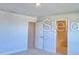 A bedroom featuring neutral walls, a door, and recessed lighting at 2303 Brassie Ct, Winter Haven, FL 33884