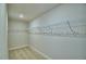 Walk-in closet featuring wire shelving for optimal storage and organization at 2303 Brassie Ct, Winter Haven, FL 33884