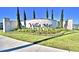 Entrance to Villa Mar community with manicured lawn and monument at 2303 Brassie Ct, Winter Haven, FL 33884