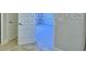 Hallway with doors and neutral walls at 2303 Brassie Ct, Winter Haven, FL 33884
