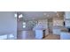 Spacious kitchen connected to living area and dining room at 2303 Brassie Ct, Winter Haven, FL 33884