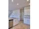 Modern kitchen with stainless steel appliances, and ample counter space for cooking at 2303 Brassie Ct, Winter Haven, FL 33884