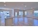 Open-concept living space with tile floors and plenty of natural light at 2303 Brassie Ct, Winter Haven, FL 33884