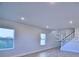 Bright living room with large windows offering natural light and views at 2303 Brassie Ct, Winter Haven, FL 33884