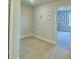 A comfortable living room featuring tile floors and neutral paint at 2303 Brassie Ct, Winter Haven, FL 33884