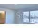 A spacious living room filled with natural light and featuring recessed lighting at 2303 Brassie Ct, Winter Haven, FL 33884