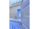 Stylish bathroom with double sinks, undermount cabinets, recessed lighting and attractive hardware at 2307 Brassie Ct, Winter Haven, FL 33884