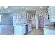 Open-concept living room with large windows at 2307 Brassie Ct, Winter Haven, FL 33884