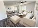 Modern living room and dining area featuring contemporary furnishings and decor at 2527 Dons Pl, Lakeland, FL 33801