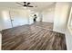 Bright living room with wood floors and neutral paint at 2527 Dons Pl, Lakeland, FL 33801