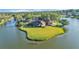 Expansive property on a peninsula, with stunning waterfront views and mature trees at 3906 Canyon Lake Pt, Lakeland, FL 33813