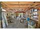 Spacious workshop interior with wood paneled walls and shelving at 4014 Mossy Oak Dr, Lakeland, FL 33810
