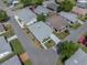 Aerial view of the house, featuring a well maintained roof and landscaping at 4965 Goldenview Ln, Lakeland, FL 33811