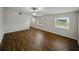 The spacious bedroom has ample natural light streaming through two windows at 4965 Goldenview Ln, Lakeland, FL 33811