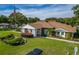 A charming clubhouse with manicured lawn, lush landscaping, and easy accessible parking at 4965 Goldenview Ln, Lakeland, FL 33811