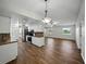 Open concept kitchen and living area creating an inviting and spacious atmosphere at 4965 Goldenview Ln, Lakeland, FL 33811
