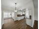 Bright and modern kitchen with granite counters, white cabinets, and stainless steel appliances at 4965 Goldenview Ln, Lakeland, FL 33811
