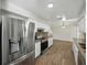 Bright kitchen features stainless steel refrigerator and stove, and spacious countertops at 4965 Goldenview Ln, Lakeland, FL 33811