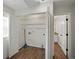 Functional laundry room with storage shelving and easy access to the utility connections at 4965 Goldenview Ln, Lakeland, FL 33811