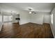 Spacious living room featuring luxury vinyl plank flooring and an open-concept design at 4965 Goldenview Ln, Lakeland, FL 33811