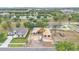New construction home with a pond view, situated in a community with lush landscaping at 505 Shanklin Ave, Bartow, FL 33830
