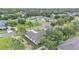 An aerial view of the property showing the roof, backyard, and surrounding neighborhood at 505 Shanklin Ave, Bartow, FL 33830