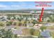 Aerial view of new construction home in community with lake view; home address at 505 Shanklin Ave at 505 Shanklin Ave, Bartow, FL 33830
