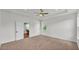 Neutral-toned main bedroom featuring a trey ceiling and natural light at 505 Shanklin Ave, Bartow, FL 33830